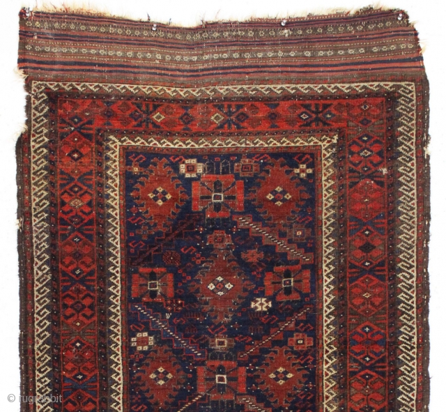 antique early baluch rug. Rare example just found locally. "as found", complete with original kelim ends but very dirty with wear and a good tear as shown. All natural colors. 3rd qtr.  ...