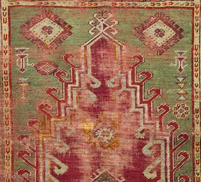 Antique turkish prayer rug. Well used older example with nice drawing and wide range of colors. Beautiful greens. "as found", with heavy wear and some small old repairs. Priced accordingly. 19th c.  ...