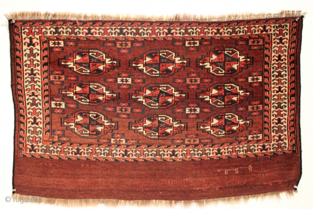 Antique chuval with skirt showing horses and human figures, some riding on horseback. Mostly good thick high pile with just a few small spots of wear. All good natural colors with a  ...