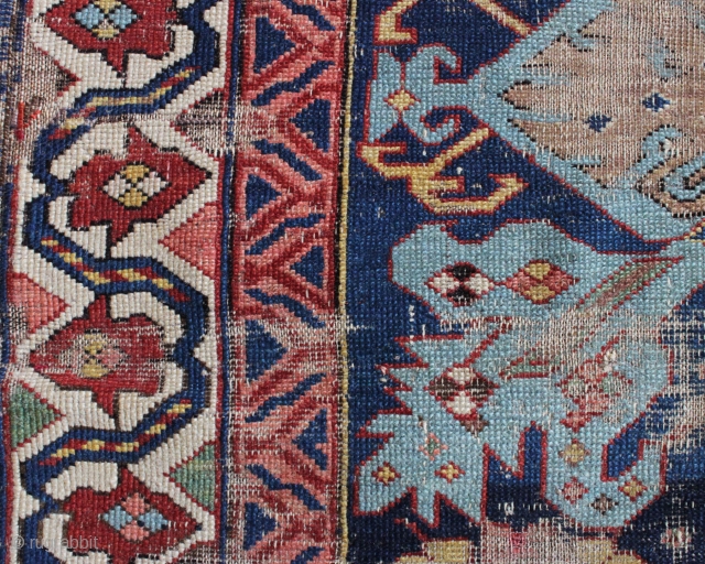 early kuba or seichour long rug with an eye catching border. And yes, I know it is worn. ca. 1850 3'7" x 9'6"          