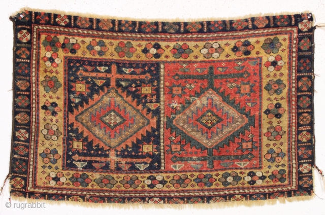 antique large kurdish bagface with double medallion design. All natural colors. "as found" with wear and edge loss as shown. Late 19th c. 26" x 42"       