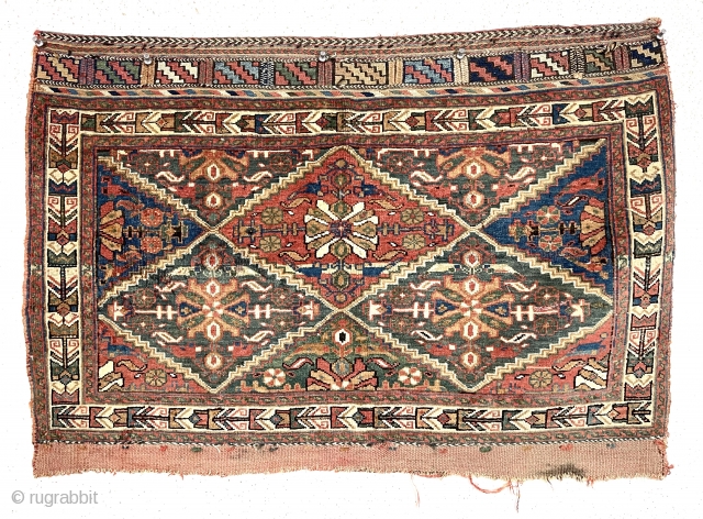 Antique large afshar bagface with an uncommon and attractive design. Some interesting features including a lovely vine border more often found on rugs than bags and extremely complex and colorful original closure  ...