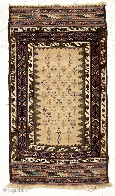 Antique unusual and attractive small Baluch weaving with mixed pile and flat weave techniques. Complex and colorful pile borders and extra fancy end kelims compliment the spacious flat woven field. Pile areas  ...