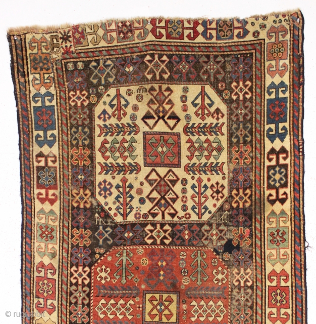 antique caucasian long rug, probably akstafa, with an interesting design featuring bold chajli type medallions. As found, with good fine weave and allover low pile, heavy brown oxidation, a few crude patch  ...