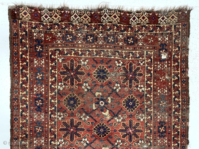 Early turkman small rug or ensi with an interesting design and good natural colors. An older example with a large scale archaic Mina khani field, good borders and eye catching skirt panels.  ...