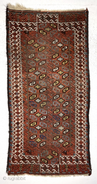 Antique Baluch rug with an unusual version of the double prayer design. Both niches created by offsetting the ivory border rather than the typical continuous design. The “tile” design field is uncommon  ...