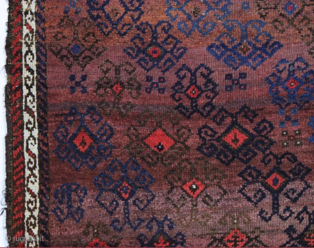antique turkish knotted baluch rug in pretty good condition with a wild design and great color. All beautiful natural colors including small bits of fiery red highlights. "as found", with allover good  ...