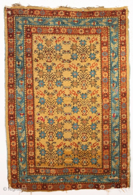 antique yellow gold rug, probably turkish with an attractive allover design and pretty good condition. As found, dirty with good pile but some end roughness as shown. Nice older floor rug. Early  ...