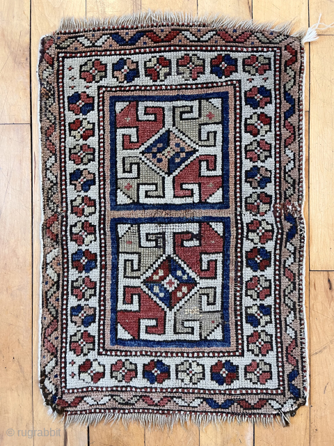 Small Turkish yastik with double ivory medallions. Needs a wash but looks like all older natural colors. Even low pile. 19th c. Winter sale priced. 16” x 23”     