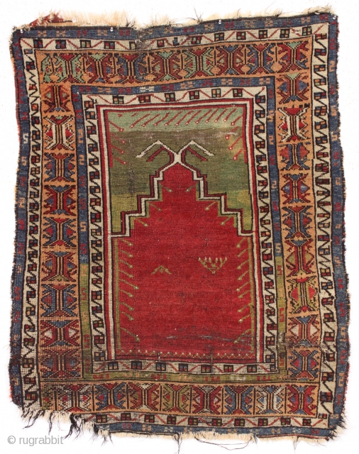 antique anatolian village prayer rug with very attractive colors. In fair condition for an older example with mostly decent pile but some wear and rough edges all around. All natural colors featuring  ...