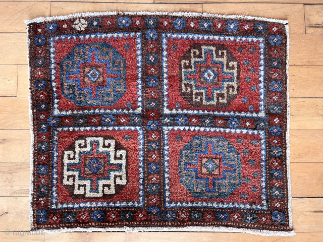 Quartered memling gul bagface, possibly northwest Persian. Good condition colorful example of this design group. Natural dyes with pretty light blues and yellow highlights. Cotton warps.  Reasonably clean. Late 19th c.  ...