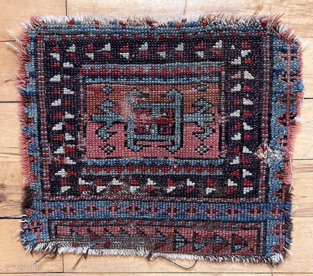 Early fragment of a Turkish yastik. Probably 1/3 of original. Good old natural colors. 19th c. 13” x 15”              