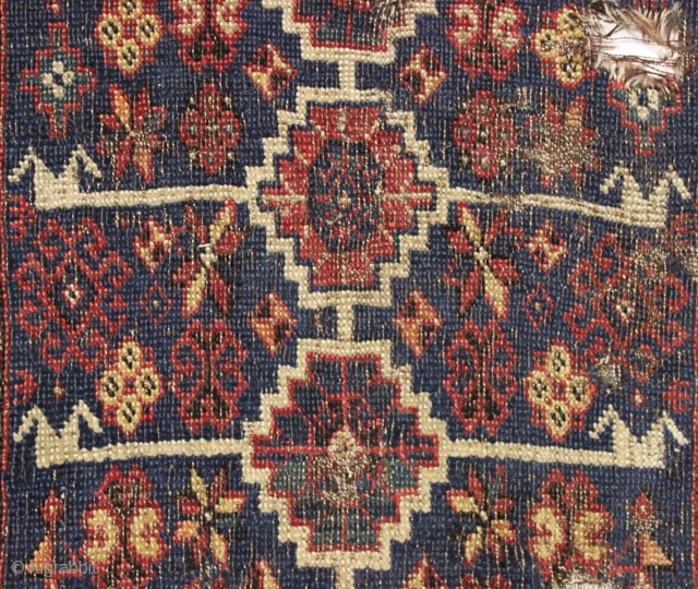 Antique very small south persian rug with an unusual design I have not seen before. All good colors. Very very rough condition. Still spell binding. 19th c. 2'6" x 3'9"    ...