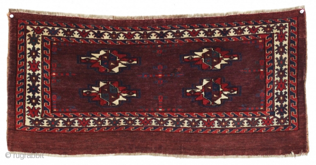 antique turkman yomud torba with an unusually spacious design and overall very good condition. Tight weave and even good glossy pile. All fine natural colors with a rich deep purplish red ground.  ...