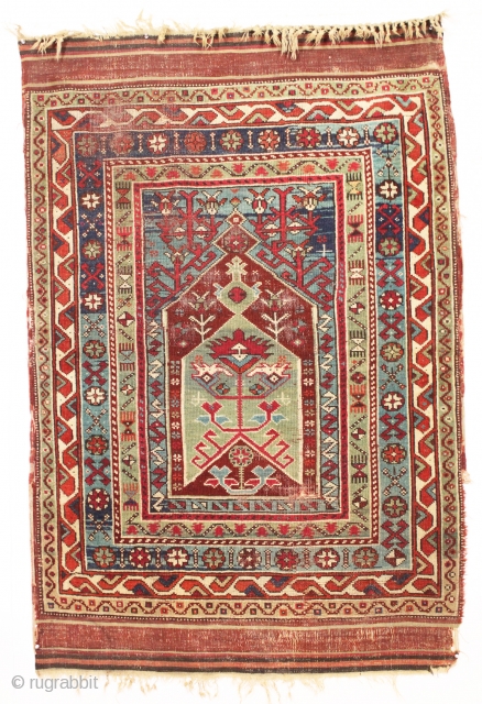 Old Turkish prayer rug. Interesting village weaving in fairly good condition with pretty all natural colors. Original selvages and kelim ends. Fresh New England find. ca. 1875. 3'9" x 5'8"   