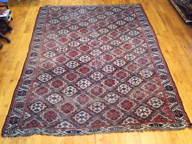 Old turkman chodor main carpet with classic ertman gul design. Overall fair condition for a genuine antique example. Scattered wear as shown but no holes or big damage. Structuraly sound and folds  ...