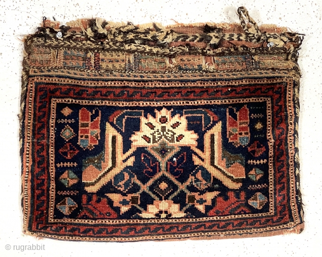 Antique small complete Afshar bag. Interesting uncommon design using part of a stylized Persian Herati motif. Overall good tight pile. Appears to be all natural colors although quite dirty and in need  ...