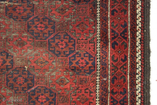 Antique baluch rug. Iconic lattice design. Fiery reds. Quite sculptural with heavy black oxidation. All natural colors. Could use a wash. 19th c.  2'11" x 5'2"      