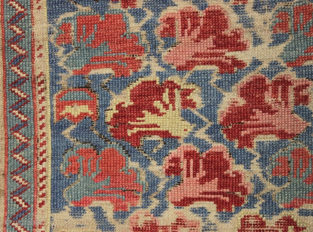 antique little kuba seichour rug with an iconic floral array on a beautiful light blue ground. "as found", overall fair pile with almost entirely oxidized browns. All natural colors including an attractive  ...