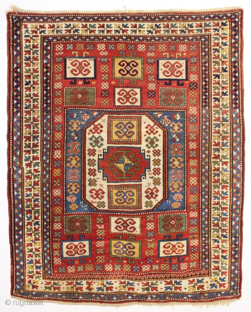 antique unusual karachopf kazak in good condition. Found in a New England barn. Beautiful large caucasian rug with all natural colors. Pretty tomato red ground with lots of light blue, richgreen and  ...