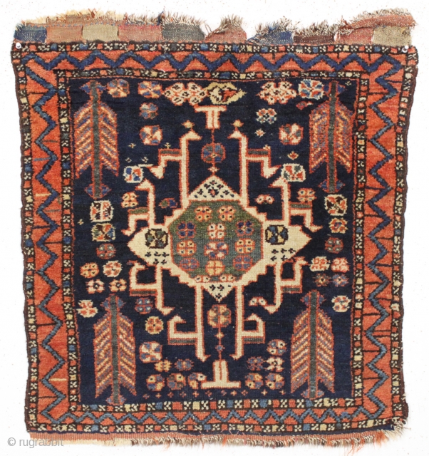 antique northwest persian bagface with an interesting design, deep blur ground and overall good pile. As found, very dirty but nice tight weave, good even pile and original closure tabs. All good  ...