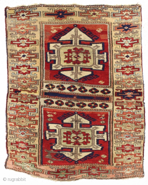 antique east anatolian kurdish rug fragment with archaic drawing and beautiful fleecy wool. All good old natural colors. Lovely soft purples and greens. Original two ends sewn together across the center. Some  ...