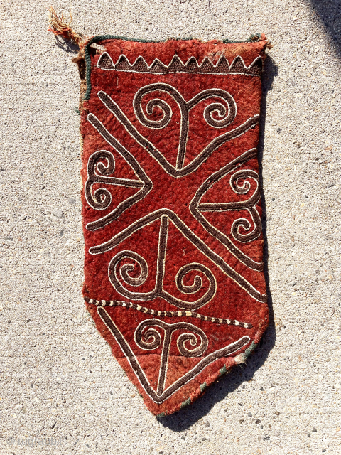 Old central Asian felt bag, presumably a holder of poles or arrows. Folder and bound on one side as shown. Fair condition with a few small old moth nibbles. Only one I  ...