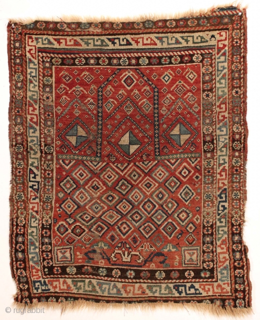 Antique caucasian mystery prayer rug with a dramatic and unusual design. Charming little rug. All good natural colors. Fair overall condition with low pile and end loss as shown. No repairs. Reasonably  ...
