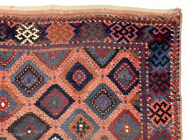 Antique east Anatolian yoruk or sarkisla rug with classic “baklava” design. Older example with fine weave and all natural colors featuring a pretty apricot ground. As found, dirty and in need of  ...