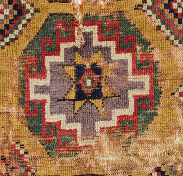 Early yellow ground Anatolian rug fragment. Remnant original selvage on both sides. Genuine art. Needs mounting. 18th c. 3'8" x 3'7"            