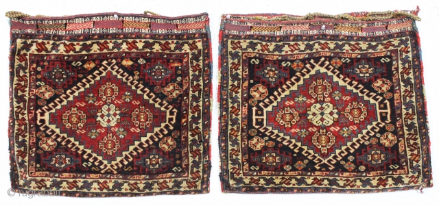 pair of antique south persian bags fresh from a local North Shore home. Both bags complete with original backs, closure tabs and loops. Both pieces in good pile with all natural colors.  ...