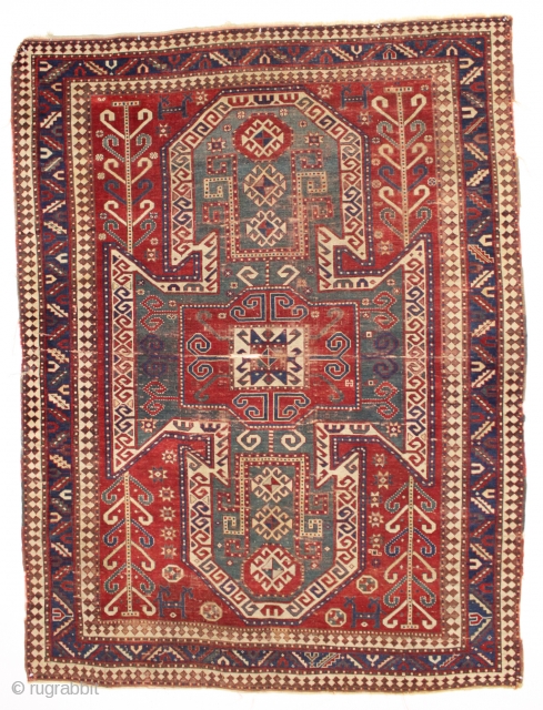 antique caucasian sewan kazak rug. Large older example of this interesting type. As found, overall thin with low plle, creases and some slight damage as shown. Heavily oxidized browns. All natural colors  ...