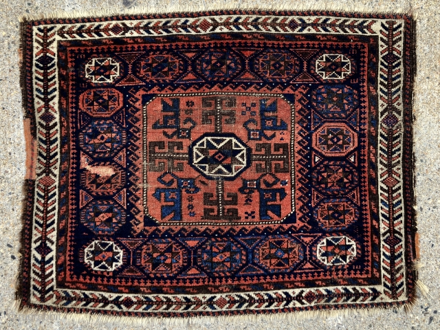 Antique large Baluch octagon bagface. Better than average drawing with nice “fish bone” border. All good colors with a nice red and light blue highlights. Mostly good pile with some wear and  ...