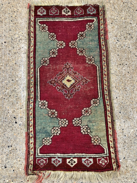 Antique Anatolian yastik in fair condition with very nice greens. Mostly decent pile with some light to moderate wear as shown. Original selvages. Natural colors including cochineal reds and real greens. As  ...