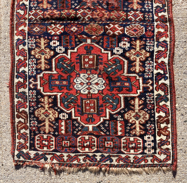 Pretty original pair of south Persian bagfaces made into a small mat as was often the case in the past. Nice drawing and good natural colors. Mostly decent pile, some wear as  ...