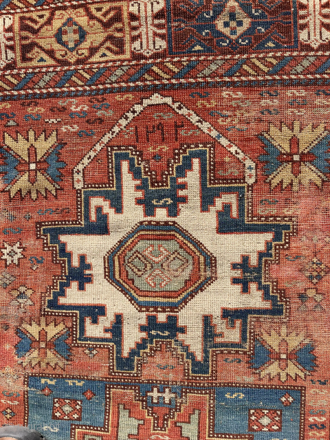 Rare Caucasian lesghi star prayer rug. Dated 1292 (1875). Nice Kufic border. Overall low pile with wear and some exposed foundation. All natural colors featuring nice greens and yellow highlights. Appears to  ...
