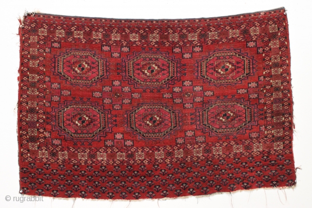 Antique Tekke chuval. Fresh to the marke example of a classic design. All good colors with a radiant field. All wool, no cotton or silk. Even low pile as shown. Sides rough.  ...