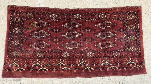 Antique large turkman chuval, yomud or kizil, in overall good condition and featuring an unusual complex and colorful elem panel. Overall even low pile with scattered light center wear. All natural colors  ...