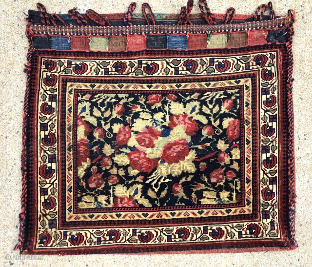 Antique Persian afshar bag in excellent condition complete with original back and closure tabs. Pretty floral rose design field with lots of true greens. Very good even pile. Rich natural colors. Few  ...