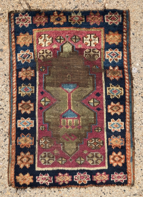 Antique east Anatolian yastik. Nice spacious drawing of this iconic design. Natural colors featuring a rich cochineal field and pretty greens. Somewhat rough condition with pile varying from good thick high to  ...