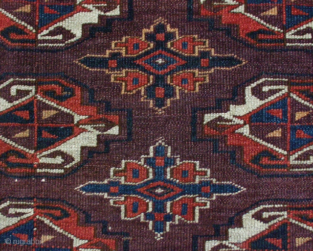 Antique Yomud chuval. Nicely drawn with interesting details. Good quality wool. Even low pile. All natural colors. ca. 1880 oe earlier. 2' 4" x  3' 9"
      