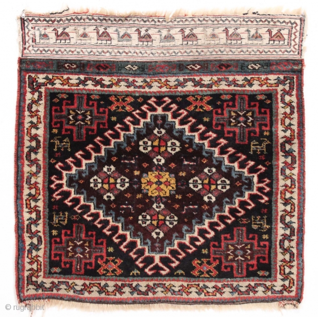 Antique Persian bagface with full thick pile and lustrous wool. Nice design featuring a terrific plain woven end with a charming camel train. All good natural colors including a rich aubergine, a  ...