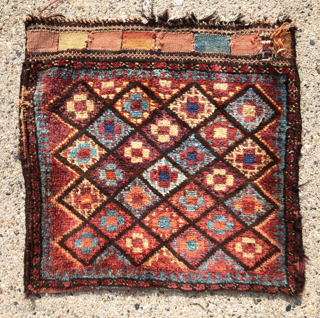 Antique complete Persian tribal bag, possibly Afshar , Luri, Baluch? Full thick high pile with very slight wear. Original back, closure tabs and goat hair wrapped selvages. All natural colors including lots  ...