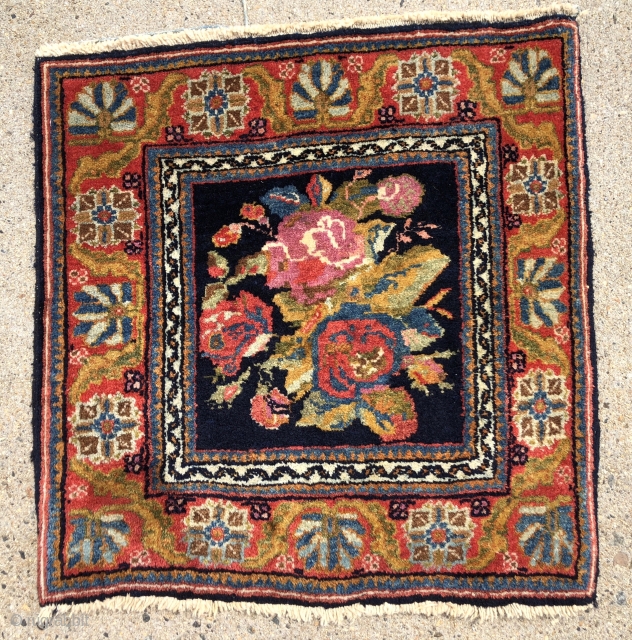 Antique little Persian bidjar mat in excellent condition with charming rose design field. Overall good high pile with typical thick bidjar weave. Lovely colors. Tiny little weaving packs a big punch. Reasonably  ...