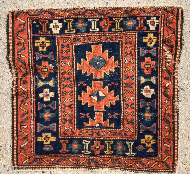 Antique little northwest Persian mat with an attractive design and pretty natural colors. Mostly even low pile with some scattered wear as shown. Appears to be a mix of single and double  ...