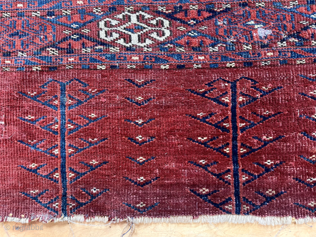 Antique large turkman Chuval in fair condition. The classic field paired with an attractive elem or skirt panel of tall flowering plants. All natural colors. Some wear and very low pile. I  ...