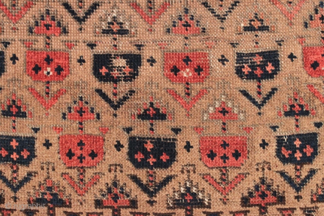 Antique small Baluch rug. Soft, supple and sophistacated. Older piece with very delicate drawing. All natural colors including a beautiful soft purple. Camel wool ground. Fair condition for the age with some  ...