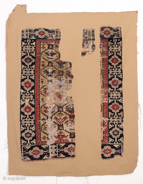 Early Shirvan rug fragment. Great design, great colors. All natural colors featuring a fine old purple. Mounted on cloth as shown. Ca. 1850 or earlier weaving. largest piece 1' 6" x   ...