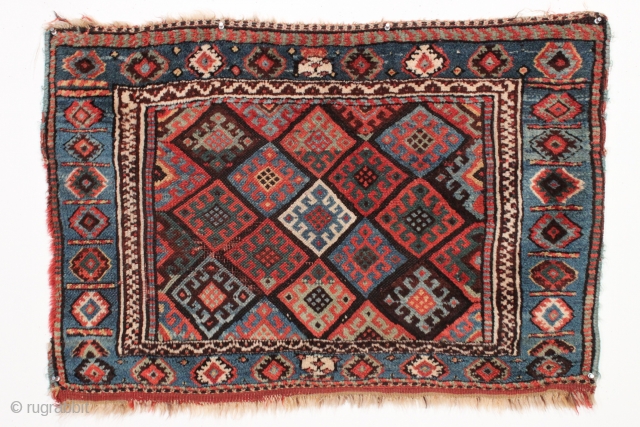 Antique Jaf Kurd bagface. Fine color and good design featuring an unusual light blue border. Large range of good natural colors. Mostly has nice thick pile, center has lower pile as shown.  ...