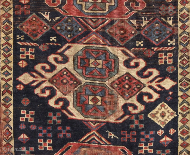 antique caucasian long rug in as found condition. An early example with unusual and elegant medallions. Beautiful border. All good natural colors. Soft and supple like cloth. A hard life with scattered  ...